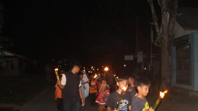 Kolaborasi Mahasiswa Kukerta Universitas Riau dan KKN Universitas Andalas Gelar Ratik Tolak Bala di Nagari Lareh Nan Panjang Selatan